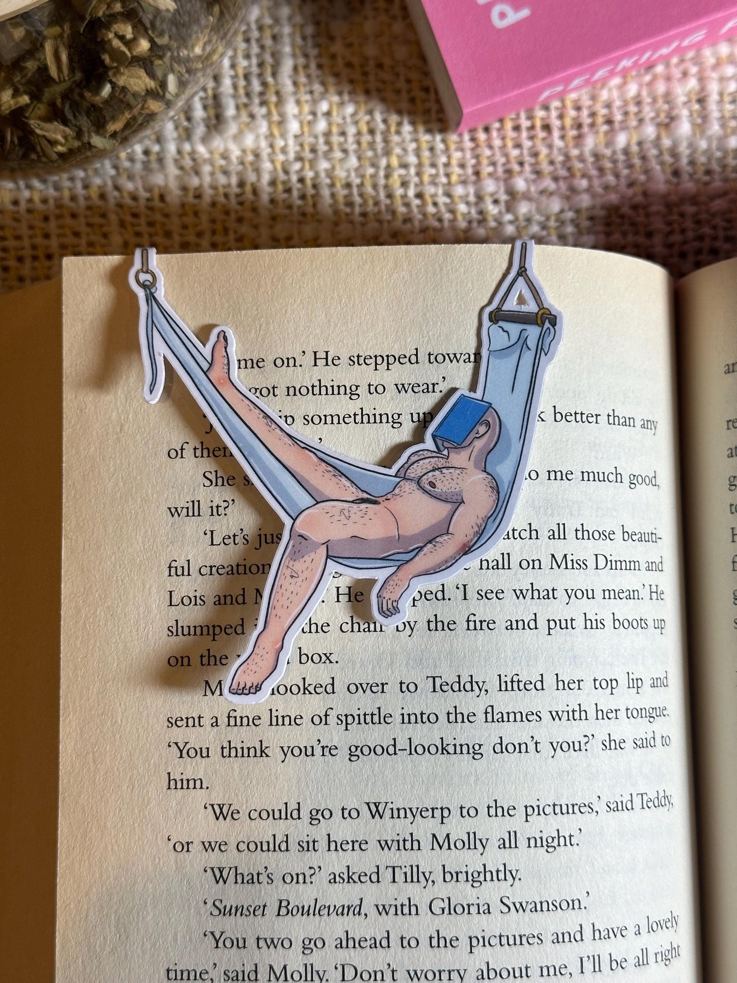 Naked man magnetic bookmark on page