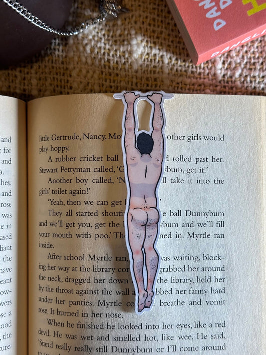 Naked man magnetic bookmark on page