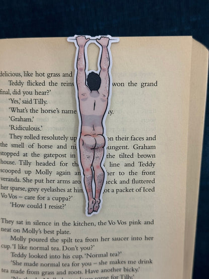 Naked man magnetic bookmark on page