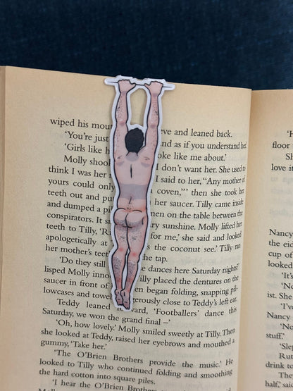 Naked man magnetic bookmark on page