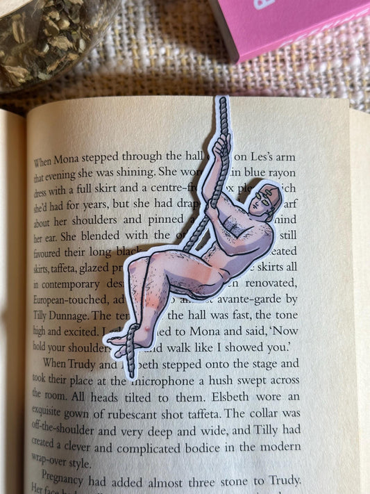 Naked man magnetic bookmark on page