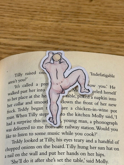 Naked man magnetic bookmark on page