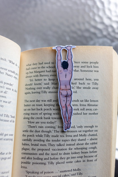 Naked man magnetic bookmark on page